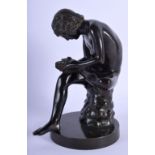 A 19TH CENTURY ITALIAN GRAND TOUR FIGURE OF THE THORN PICKER modelled upon an oval base. 21.5 cm hig