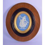 AN ANTIQUE WEDGWOOD BLUE BASALT JASPERWARE PORCELAIN PLAQUE decorated with a classical female. 24 cm