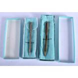 TWO BOXED TIFFANY & CO SILVER PENS. (2)