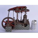 A LOVELY SCRATCH BUILT CAST IRON PUMP ENGINE upon an imitation brick base. 32 cm x 25 cm.