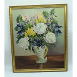 Framed Oil on canvas of a study of flowers possibly school of McMurtrie 59 x 49cm.