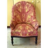 A VICTORIAN UPHOLSTERED ARM CHAIR with rectangular frieze and card legs. 90 cm x 60 cm.