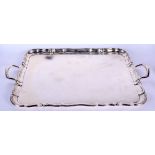 A LARGE TWIN HANDLED SILVER SERVING TRAY. Sheffield 1923. 4188 grams. 69 cm x 42 cm.