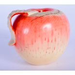 A 19TH JAPANESE MEIJI PERIOD POLYCHROMED IVORY OKIMONO modelled as a peeled apple. 7 cm x 6 cm.