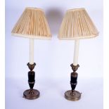 A PAIR OF 19TH CENTURY FRENCH EMPIRE STYLE BRASS CANDLESTICKS converted to lamps. Candle 17.5 cm hig