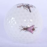 A HEREND PORCELAIN GOLF BALL. 4.5 cm wide.