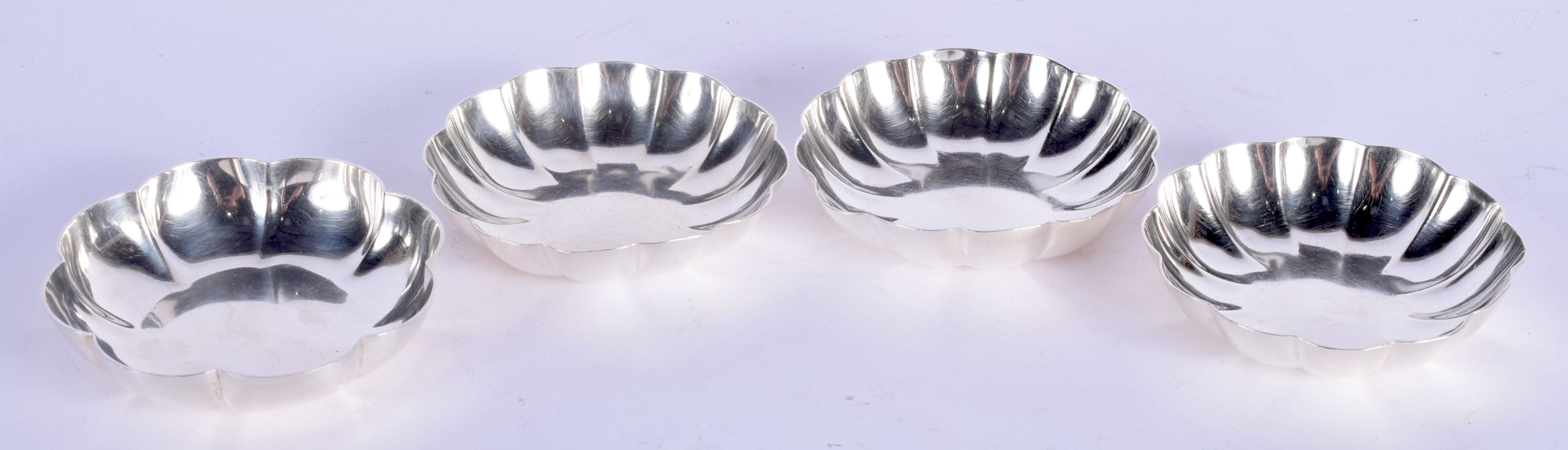 FOUR 1970S ENGLISH SILVER DISHES. 266 GRAMS. 9 cm wide. (4)