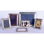 SIX SILVER PHOTOGRAPH FRAMES. London 1985 to 1993. 1962 grams overall. Largest 30 cm x 24 cm. (6)