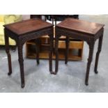 A PAIR OF 19TH CENTURY CHINESE HARDWOOD RECTANGULAR TOP TABLES Qing, carved with dragon mask heads.