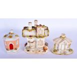 THREE ANTIQUE STAFFORDSHIRE POTTERY HOUSES one in the form of a money box. Largest 13 cm x 9 cm. (3)