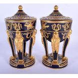 A PAIR OF 19TH CENTURY FRENCH SEVRES PORCELAIN VASES AND COVERS painted with gilt foliage and object