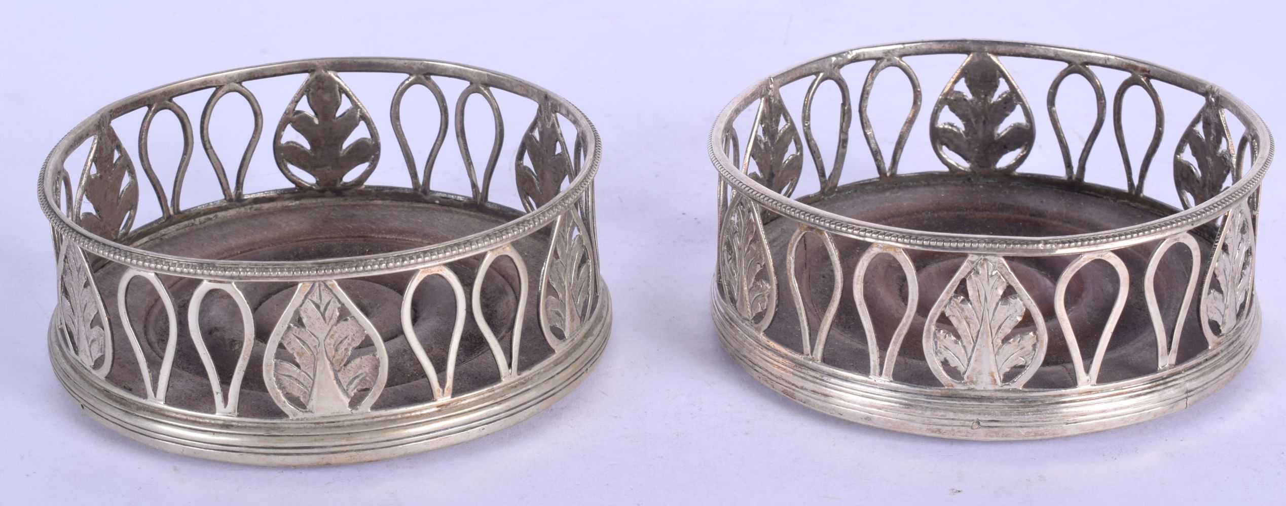 A PAIR OF ANTIQUE CONTINENTAL SILVER COASTERS. 12 cm diameter. - Image 2 of 3