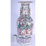 A LARGE 19TH CENTURY CHINESE CANTON FAMILLE ROSE PORCELAIN VASE Qing, overlaid with foliage and figu