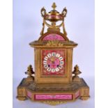 A 19TH CENTURY FRENCH GILT BRONZE AND SEVRES PORCELAIN MANTEL CLOCK painted with pink putti panels,