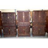 THREE EARLY 20TH CENTURY CHINESE CARVED HARDWOOD DRAGON CABINETS Late Qing/Republic, each panel deco