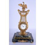 A MID 19TH CENTURY FRENCH EMPIRE STYLE BRONZE AND MARBLE LYRE CLOCK with hanging swags. 36 cm x 18 c