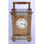 AN ANTIQUE FRENCH CARRIAGE CLOCK with openwork foliate embellished face plate. 15.5 cm high inc hand