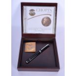 A BOXED GENTLEMAN'S DUKE OF GERMANY CHOPIN AMBER TOPPED PEN. 11 cm long.