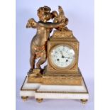 A MID 19TH CENTURY FRENCH GILT BRONZE AND MARBLE MANTEL CLOCK modelled as a young putti holding a co