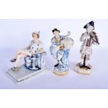 A 19TH CENTURY MEISSEN BLUE AND WHITE PORCELAIN FIGURE together with two others. Largest 18 cm x 15