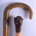 A 19TH CENTURY MIDDLE EASTERN CARVED RHINOCEROS HORN WALKING CANE together with a Bavarian black for