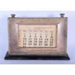 AN ANTIQUE SILVER DESK CALENDAR. 20 cm x 15 cm.