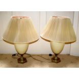 A PAIR OF WRYTHEN MOULDED GLASS COUNTRY HOUSE LAMPS. Glass and Brass 40 cm high.