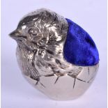 AN EDWARDIAN SILVER PLATED CHICK PIN CUSHION. 4.5 cm x 3.5 cm.