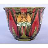 A MINTON SECESSIONIST MOVEMENT POTTERY PLANTER decorated with flowers. 18 cm x 18 cm.