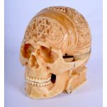 A RARE 19TH CENTURY EUROPEAN CARVED IVORY MEMENTO MORI SKULL CLOCK with Swiss movement. 5.5 cm wide.