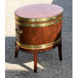 A GEORGE III BRASS INLAID WINE COOLER ON STAND with brass handles. 72 cm x 67 cm.