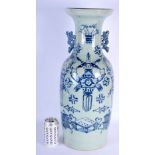 A LARGE 19TH CENTURY CHINESE CELADON BLUE AND WHITE PORCELAIN TWIN HANDLED VASE Qing, painted with p