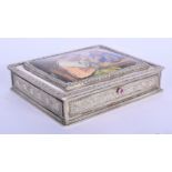 AN ANTIQUE CONTINENTAL SILVER AND ENAMEL BOX AND COVER painted with two figures smoking. 245 grams.