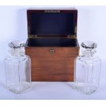 AN EDWARDIAN MAPPIN & WEBB TWO BOTTLE CASED DECANTER BOX containing two crystal bottles. 26 cm x 24