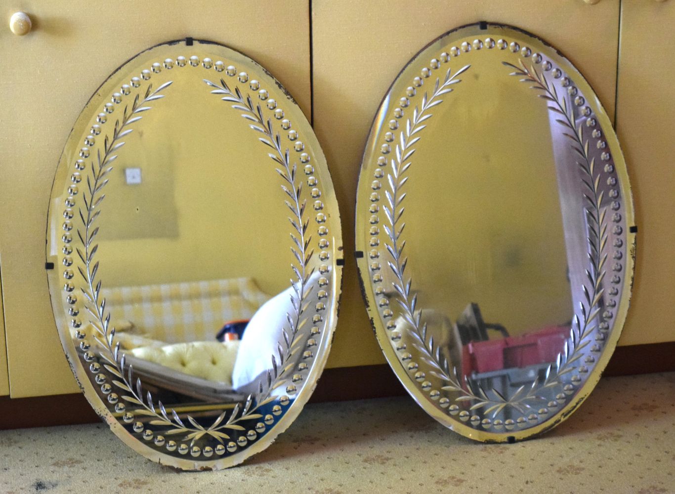 A PAIR OF ANTIQUE CUT GLASS MIRRORS possibly George III and Irish. 80 cm x 50 cm.