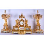 A VERY LARGE 19TH CENTURY FRENCH SEVRES PORCELAIN CLOCK GARNITURE inset with panels of putti and ban