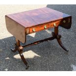 A REGENCY MAHOGANY DROP FLAP SOFA TABLE overlaid with floral roundels, the legs overlaid with motifs