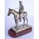 A RARE GEORGE V SILVER FIGURE OF A SOLDIER ON HORSEBACK modelled upon a textured base. Sheffield 191