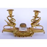 AN ANTIQUE FRENCH BRASS INKWELL. 30 cm x 15 cm.