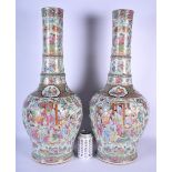 A RARE LARGE PAIR OF 19TH CENTURY CHINESE FAMILLE ROSE PORCELAIN BOTTLE NECK VASES Qing, possibly ma