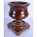 AN 18TH CENTURY EUROPEAN CARVED TREEN FRUITWOOD PEDESTAL BOWL ON STAND. 21 cm x 13 cm.