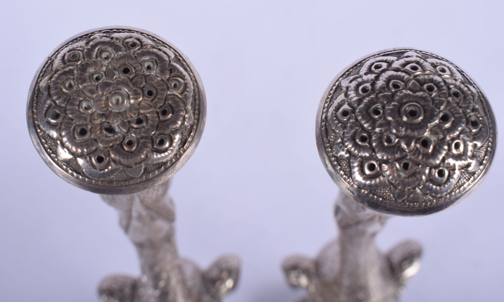 A RARE PAIR OF 19TH CENTURY INDIAN SILVER ROSEWATER SPRINKLERS modelled as birds holding aloft flora - Image 6 of 29