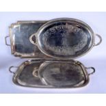 THREE ANTIQUE SILVER PLATED SERVING TRAYS. Largest 74 cm x 40 cm. (3)