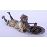 A 19TH CENTURY AUSTRIAN COLD PAINTED BRONZE FIGURE OF A RECLINING BOY by Franz Xavier Bergmann (1861