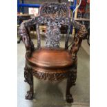 A FINE 19TH CENTURY CHINESE CARVED HARDWOOD HONGMU DRAGON CHAIR Qing, wonderfully formed with panels