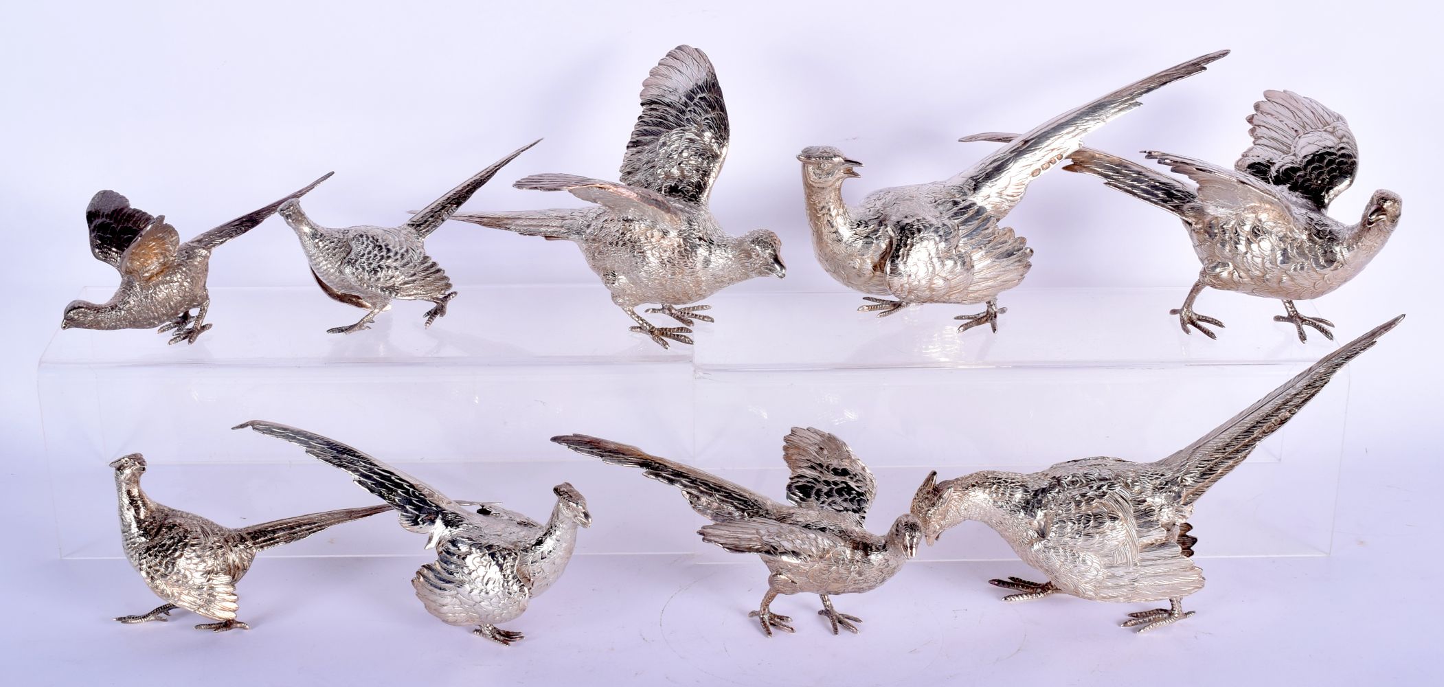 A FINE COLLECTION OF ENGLISH SILVER MODELS OF GAME BIRDS each modelled in various stances. 2196 gram
