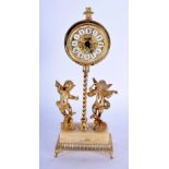 A VINTAGE GERMAN GILT METAL MANTEL CHERUB CLOCK. 20 cm high.