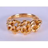 A VINTAGE 18CT GOLD KNOT RING. 6 grams. M.