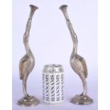 A RARE PAIR OF 19TH CENTURY INDIAN SILVER ROSEWATER SPRINKLERS modelled as birds holding aloft flora