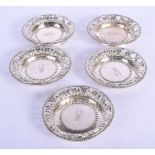 FIVE ANTIQUE CONTINENTAL SILVER OPENWORK DISHES. 341 grams. 11 cm wide. (5)